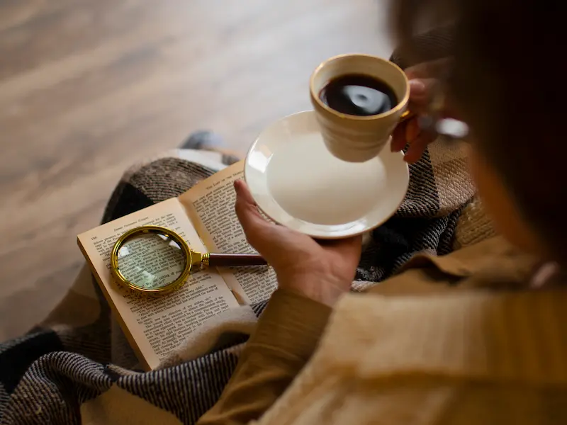 A person discussing faith over coffee in relaxed setting