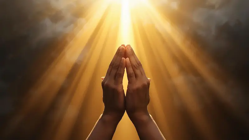 Hands raised in prayer to Jesus for salvation and deliverance