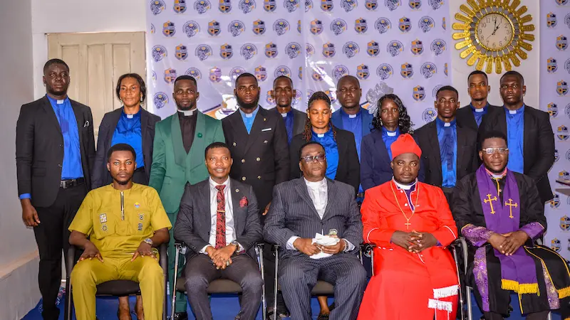Apostle Isaac Rockefeller Asamoah with ministers and graduates at a ministerial ordination ceremony